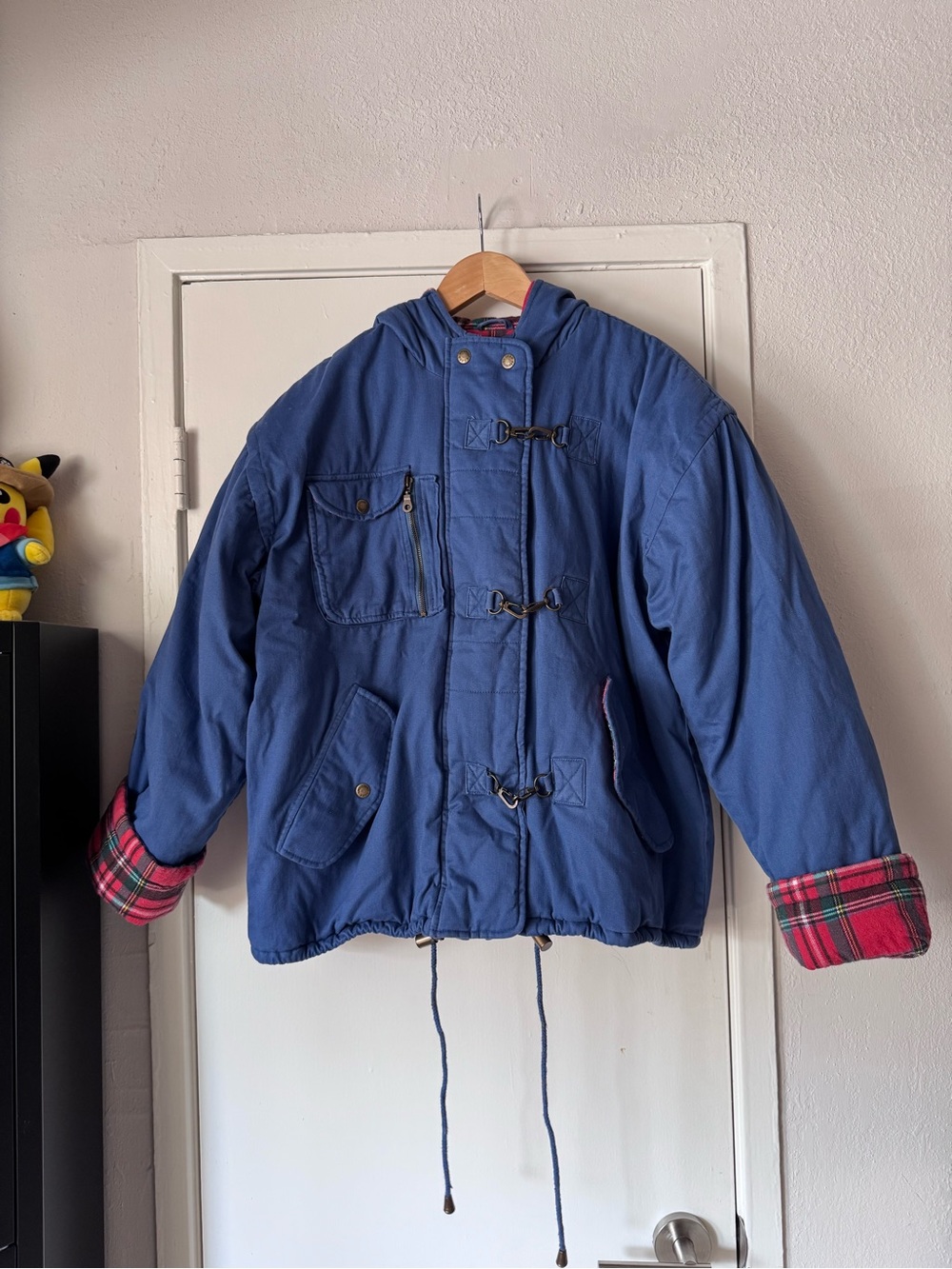 Rainbow Plaid Jacket with Blue Label and Green Triangle